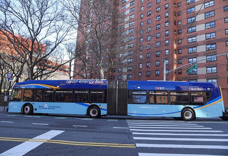 Blue Electric Bus on the road in New York