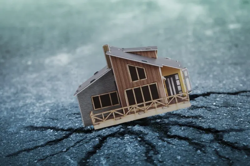 What is the Environmental Impact of Fracking? 5 House on cracked road
