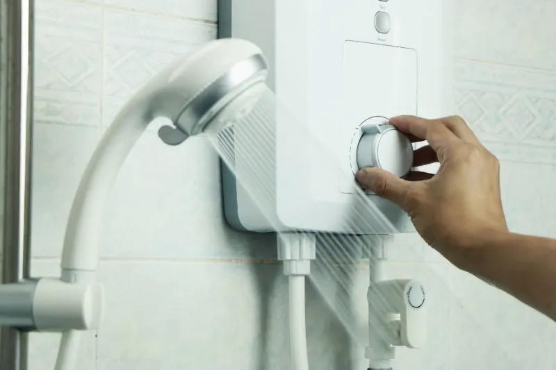 How to Make a Mobile Home More Energy Efficient 8 Hand regulate the temperature of hot water in electric water heater