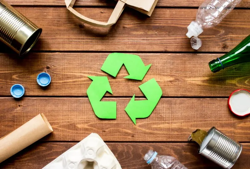 recycling symbol on table background top view