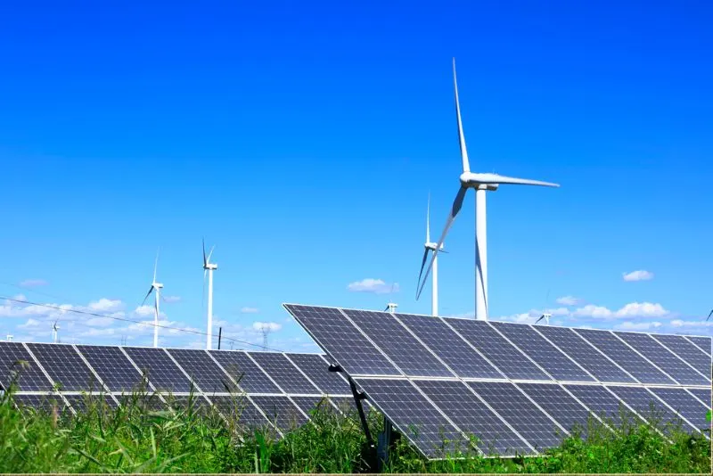 Solar photovoltaic panels and wind turbines. 