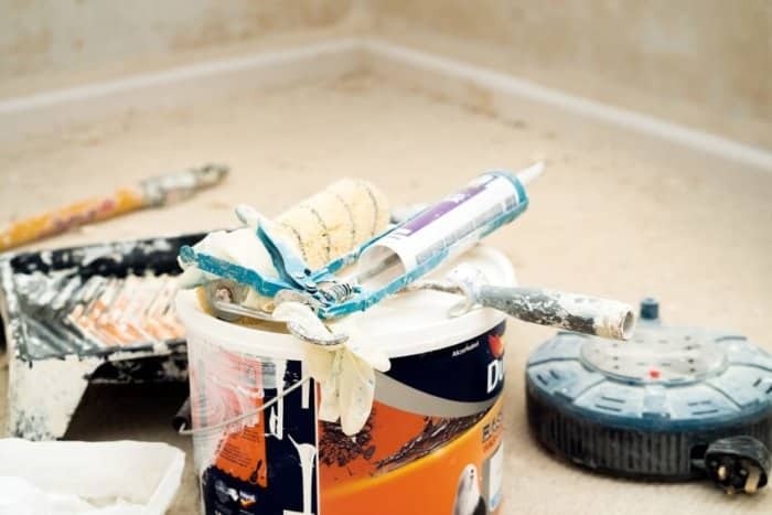 A Caulk on the Top of a Paint Bucket