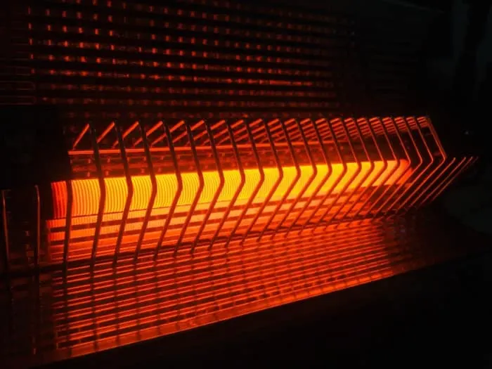 How to Grow Vegetables Year Round in a Greenhouse 9 Red Orange Light from a Heater