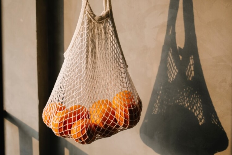 Oranges Inside a Net Eco-Friendly Bag