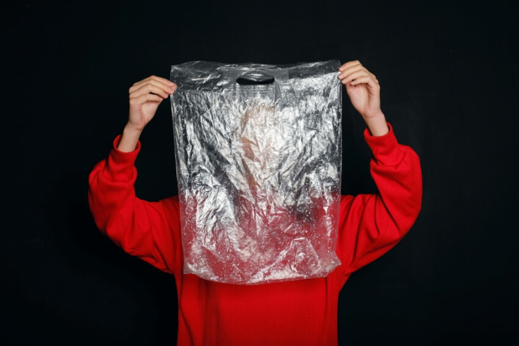 Woman Holding a Plastic  Bag