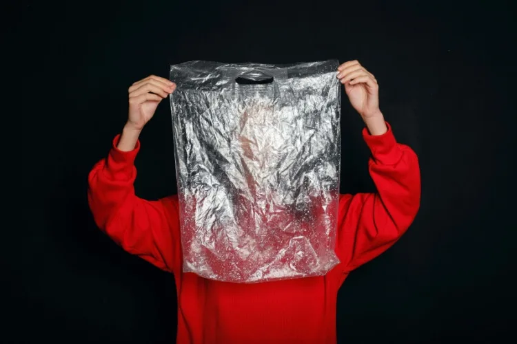 Woman Holding a Plastic  Bag