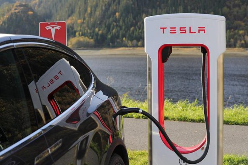 Tesla Charging on a Charging Station