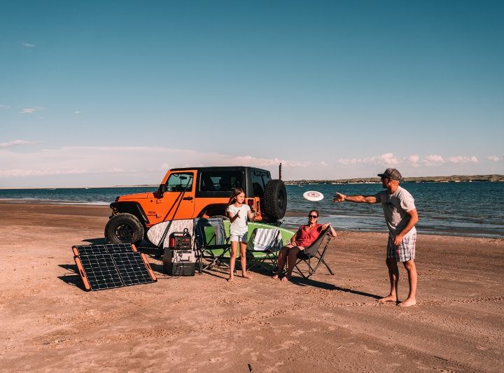 family Using a Solar Portable Generator