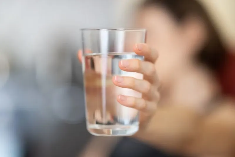 Holding a Glass of Water