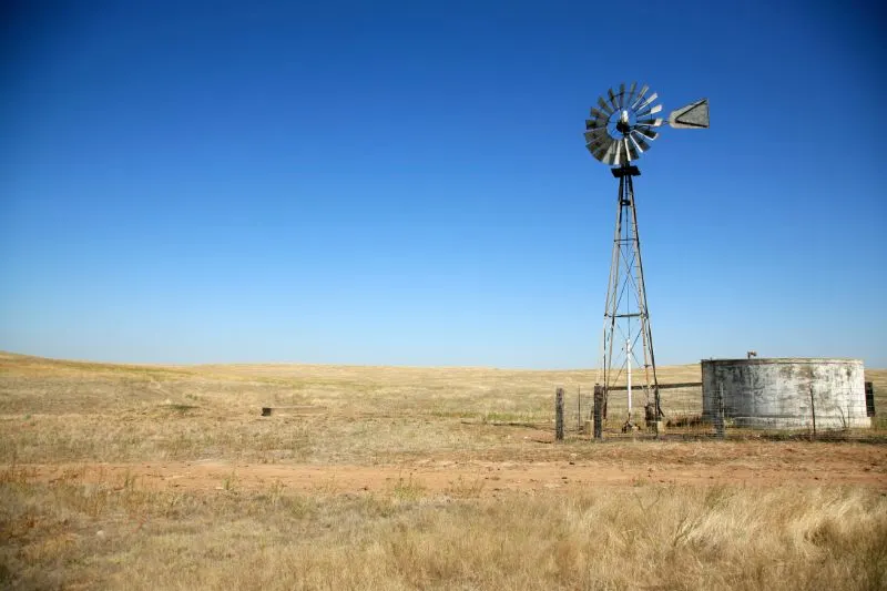Wind powered pump next to a water well