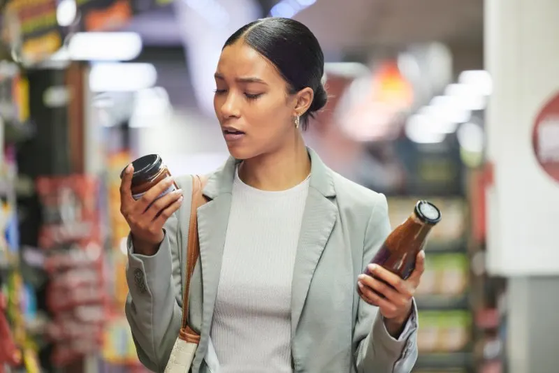 Lady reading product labels