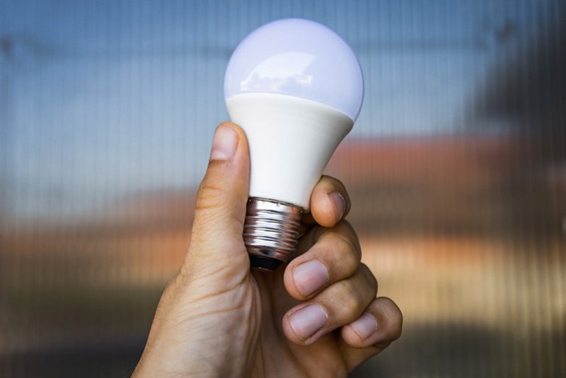 Close Up on a LED Light Bulb in the Hand