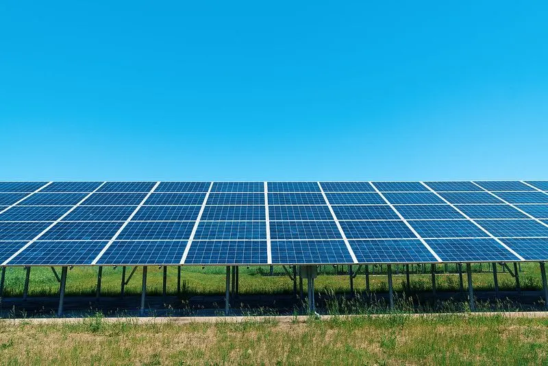 Wide Solar Energy Panels in the Sun and a blue sky