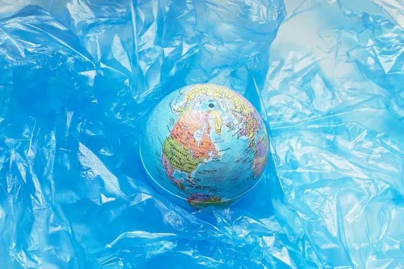 The Environmental Impact of Plastic Pollution: Is It Too Late to Solve? 6 blue plastic around a globe