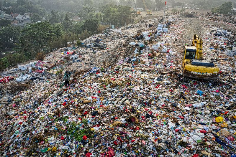 piles of plastics on a landfill