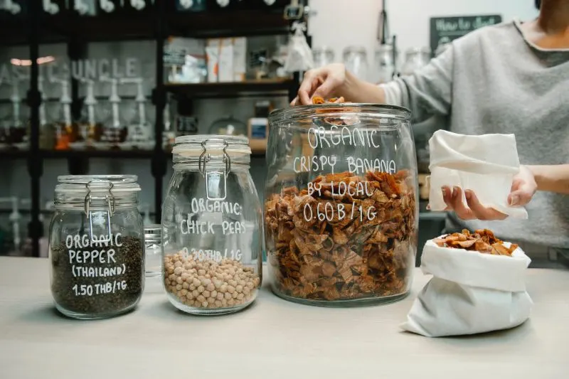 The Environmental Impact of Plastic Pollution: Is It Too Late to Solve? 8 variety of organic products on glass jars