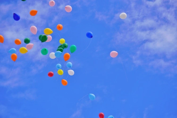 Helium Filled Balloons Flying Up