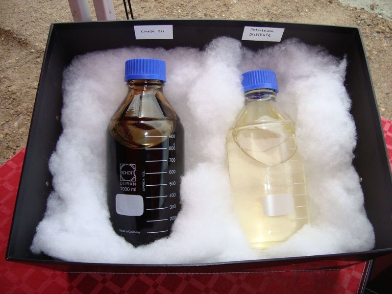 Bio-crude oil and liquid fuel in a plastic bottle