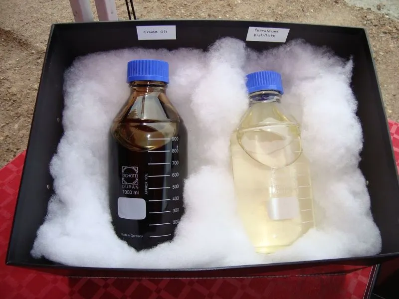Bio-crude oil and liquid fuel in a plastic bottle
