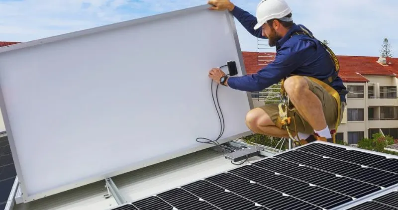 Technician installing Solperk Solar kit set