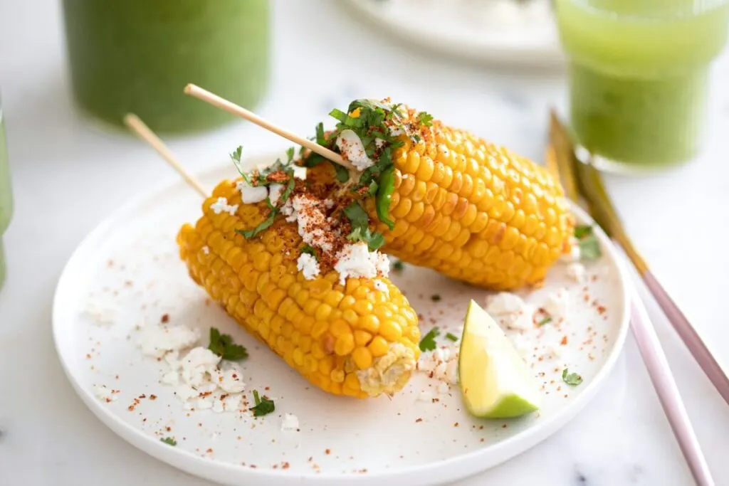 Is Corn Bad for the Environment? 2 Plate of a corn cob dish in sticks
