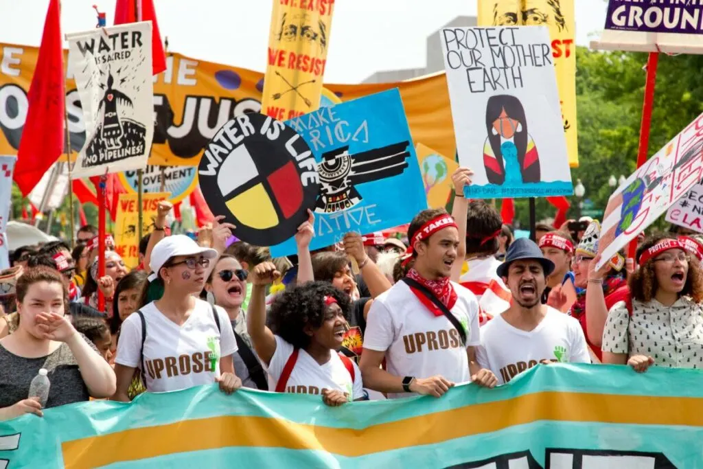 Australia’s Nature Repair Market: How It Works in 2026 1 Environmental protesters holding signs during a public demonstration