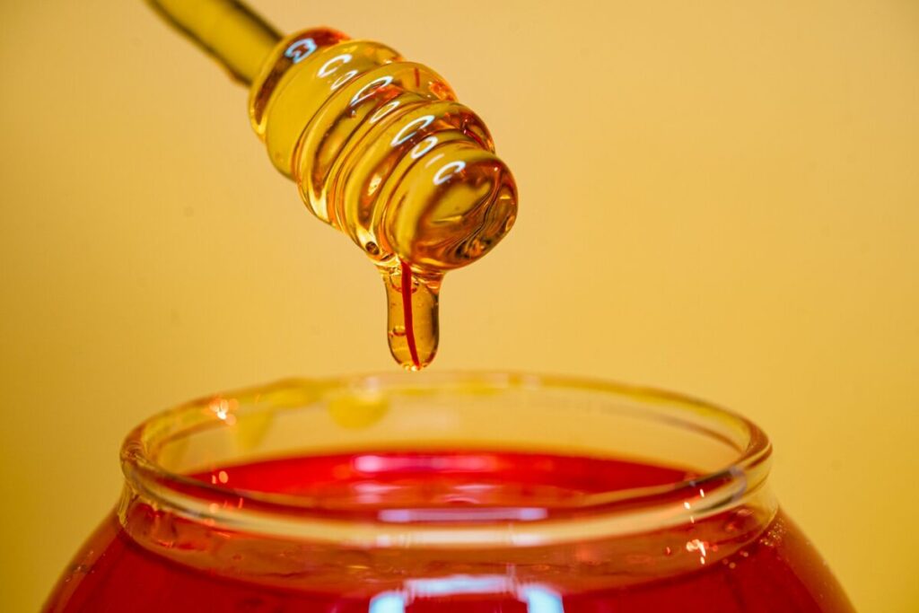 Dripping honey from the honey jar