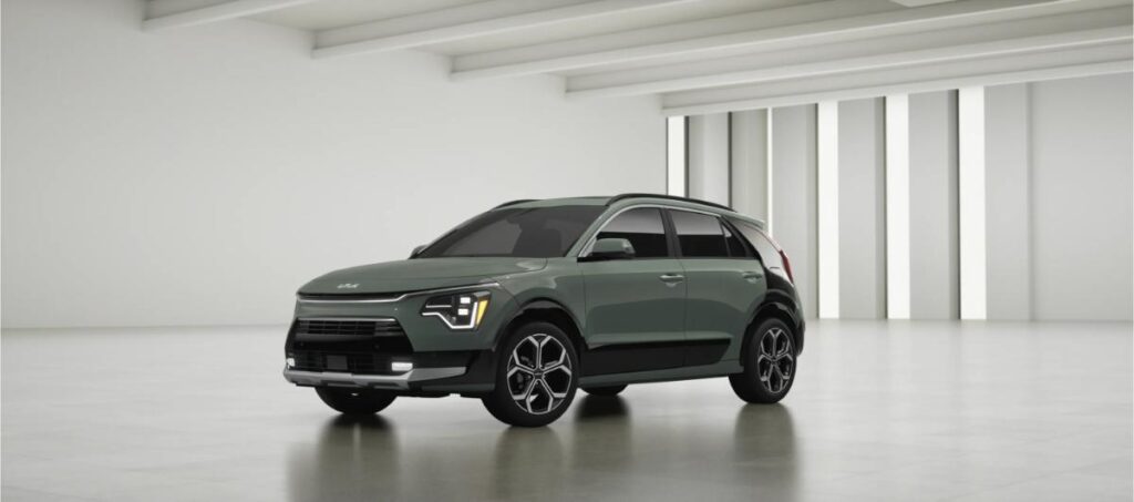 10 Most Eco-Friendly Cars for Different Lifestyles in 2026 12 The Kia Niro FE, featuring a contemporary exterior, is displayed in a natural outdoor setting.