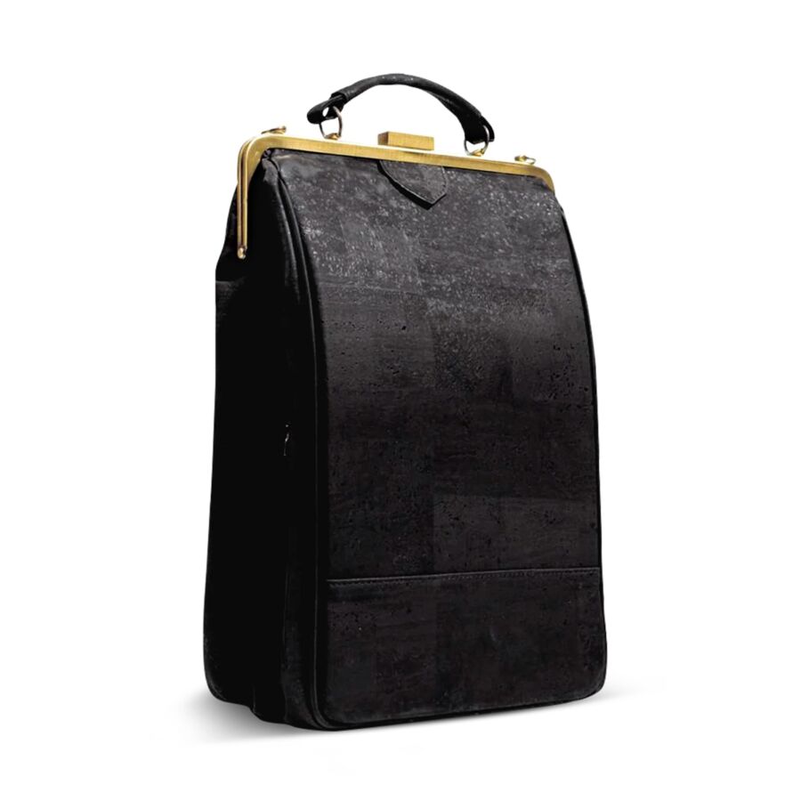 25 Best Vegan Backpacks for Work & Travel (2026) 18 Stylish black suitcase with gold accents and a handle, perfect for travel or storage.