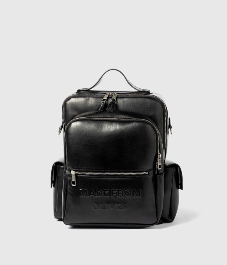 25 Best Vegan Backpacks for Work & Travel (2026) 20 Black backpack featuring the word "motorcycle" prominently displayed on the front.