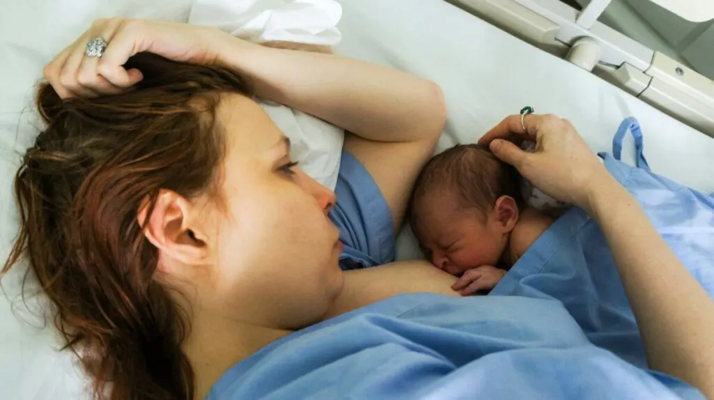 Are Humans Animals? 15 Things to Know 9 Woman breastfeeding her newborn baby