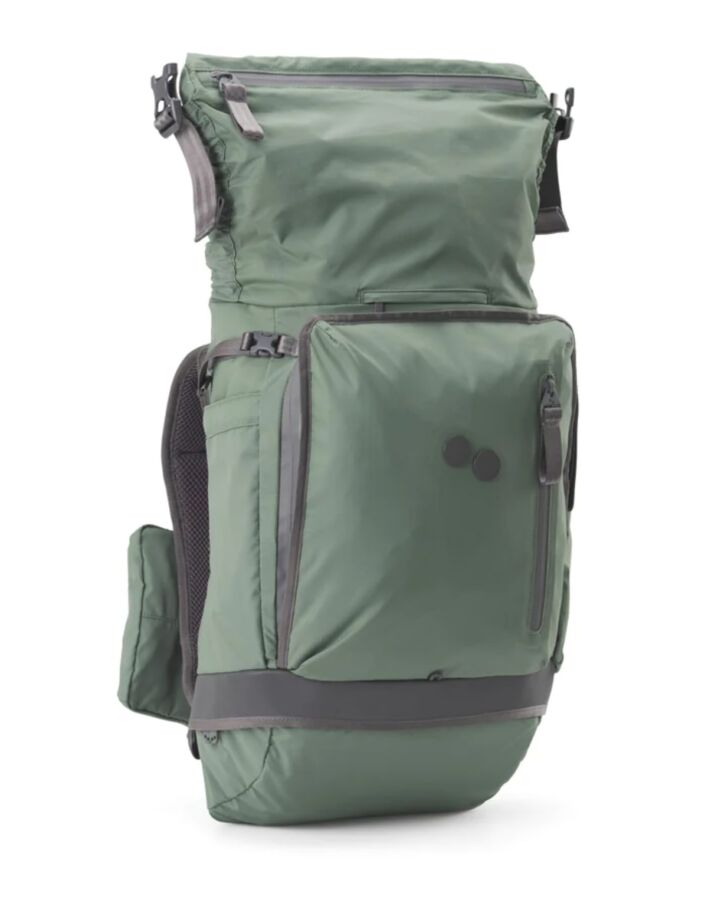 25 Best Vegan Backpacks for Work & Travel (2026) 3 The pinqponq Komut Medium backpack features a vibrant green fabric, highlighting its contemporary design and functionality.