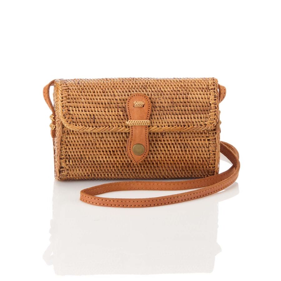 10 Best Fair Trade Handbags for 2026 10 Rattan crossbody bag featuring a leather strap, highlighting its natural material and elegant design for everyday use.