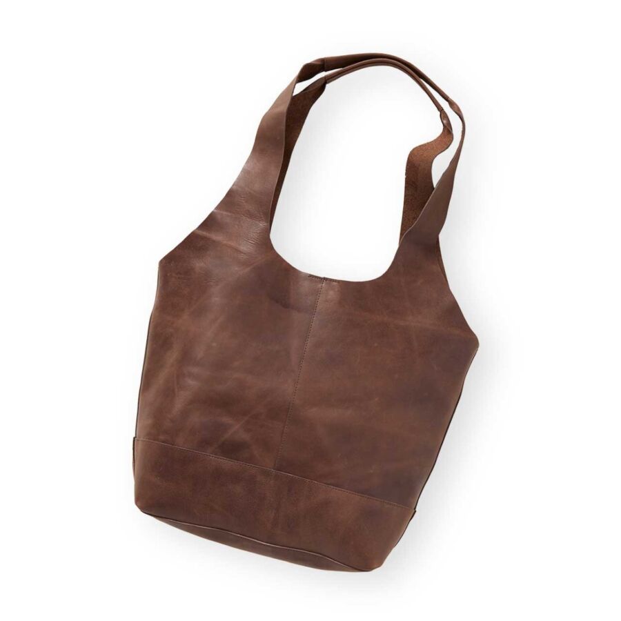 10 Best Fair Trade Handbags for 2026 6 Brown leather tote bag with a slouchy design, featuring a relaxed shape and casual style.