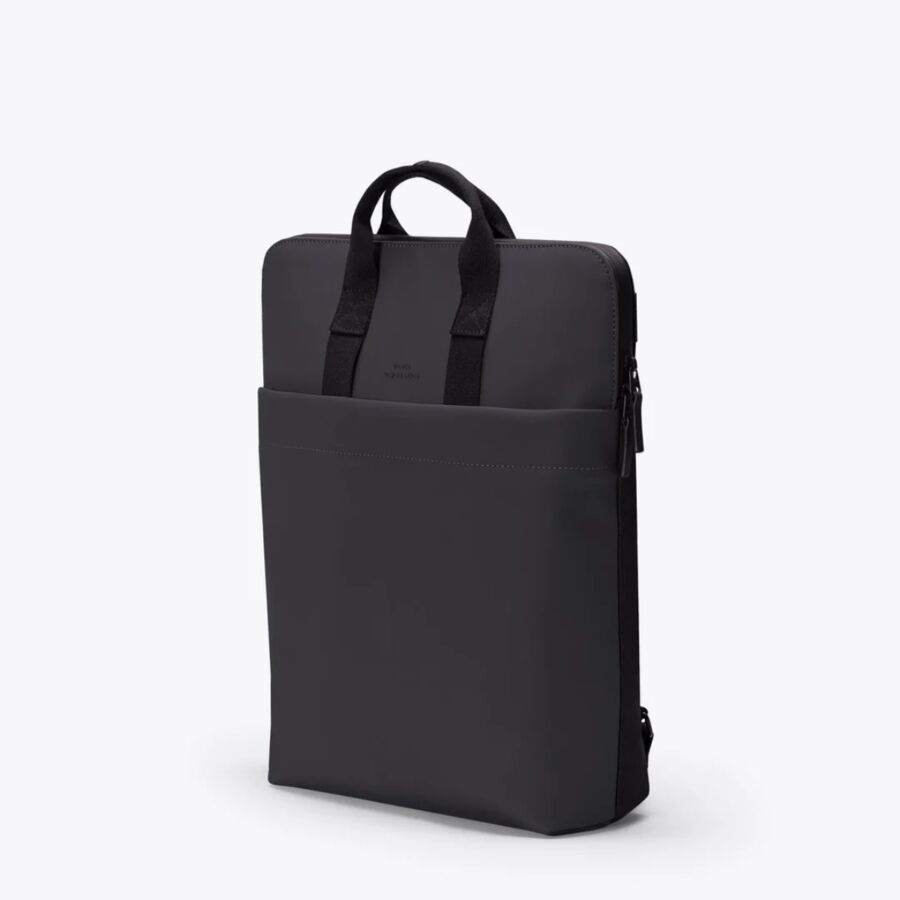 25 Best Vegan Backpacks for Work & Travel (2026) 35 Black laptop bag with a front zipper, designed for style and functionality, ideal for daily use.