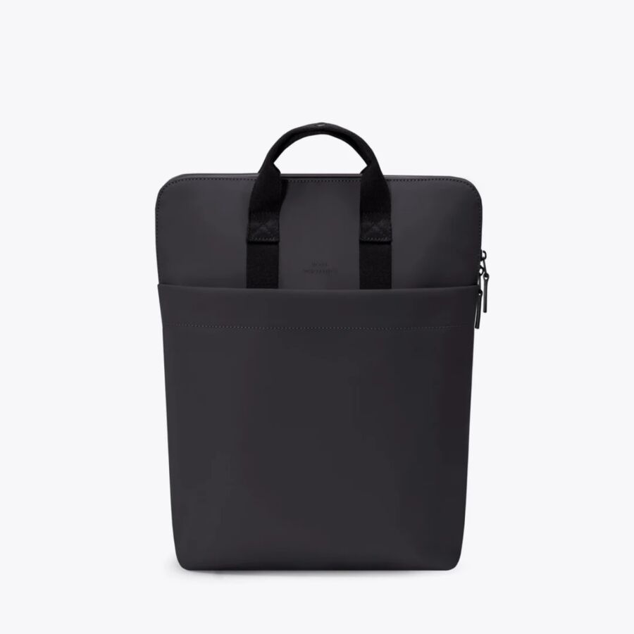 25 Best Vegan Backpacks for Work & Travel (2026) 14 Black laptop bag by Ucon Acrobatics, model Masao Medium, designed with a comfortable handle for portability.