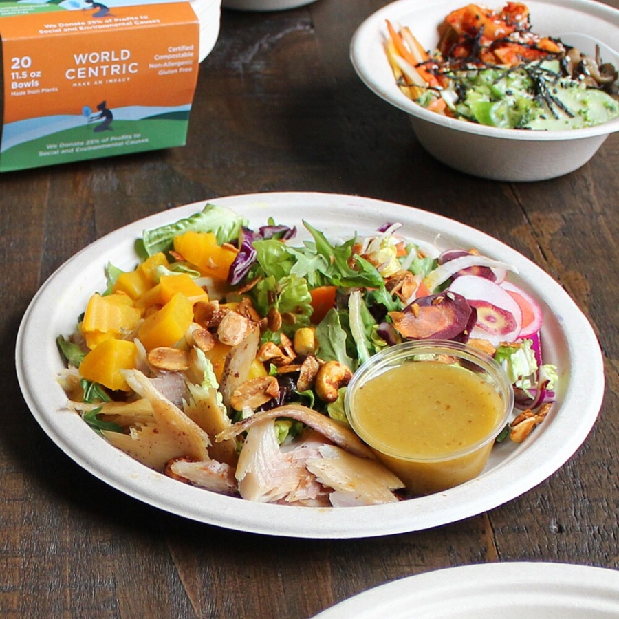 11 Best Compostable Plates for Parties and Everyday Meals 19 Table setting featuring a 9-inch fiber round plate with a bowl of salad and a bowl of soup.